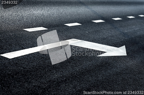 Image of Arrow sign on the road