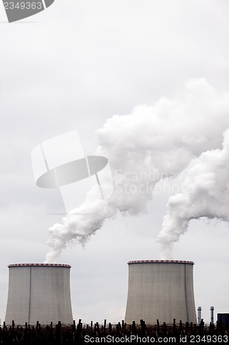 Image of Modern power plant exhausting large amount of vapor