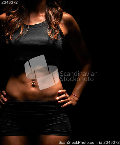 Image of Muscular fitness instructor in a studio