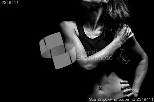 Image of Muscular fitness instructor in a studio