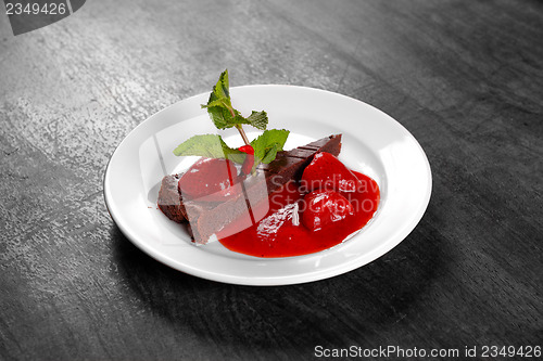 Image of Chocolate cake wth strawberry and chilli