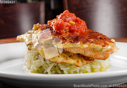 Image of Fried chicken ribs and rice with tomato sauce