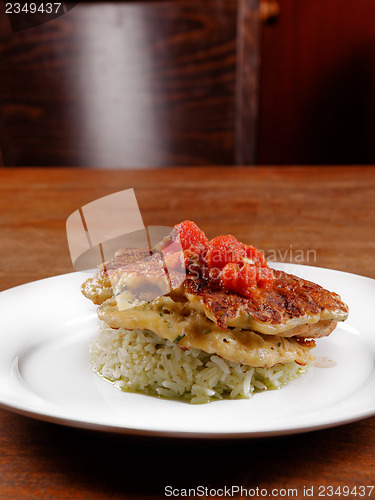 Image of Fried chicken ribs and rice with tomato sauce