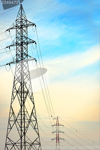 Image of Electric tower against blue sky