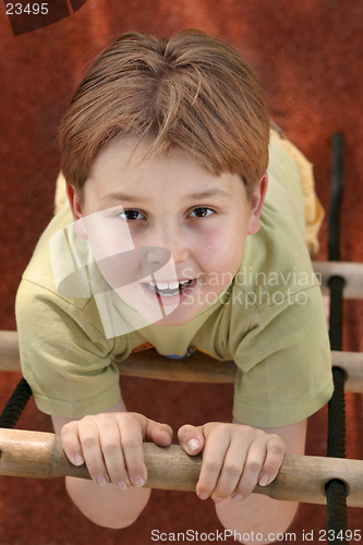 Image of Climbing a rope ladder