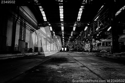 Image of Interior of a vehicle repair station in black and white