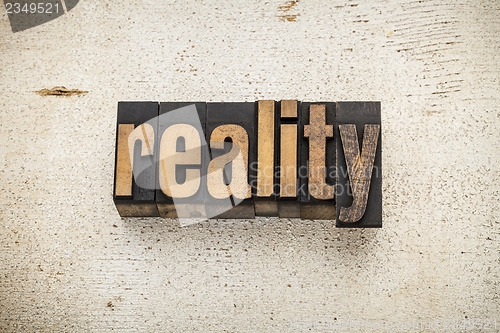 Image of reality word in wood type