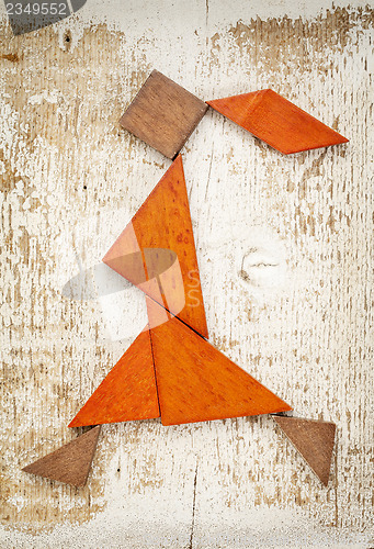 Image of tangram walking girl figure