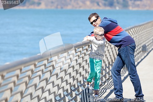 Image of family of two outside