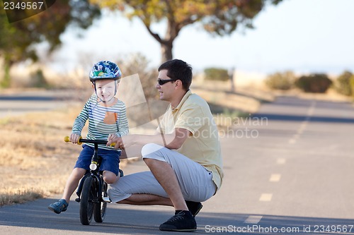 Image of family of two outside