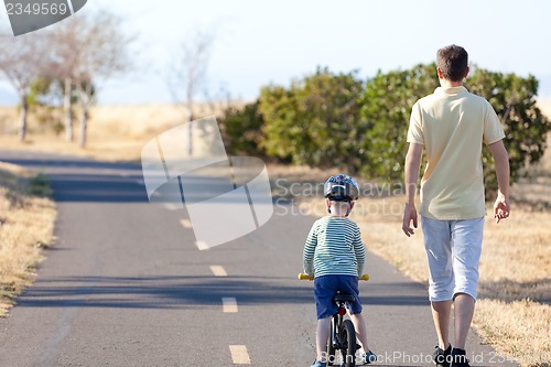 Image of family of two outside
