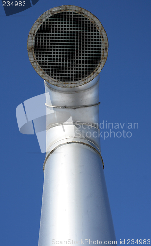 Image of Shiny metallic ventilation pipe with wire mesh