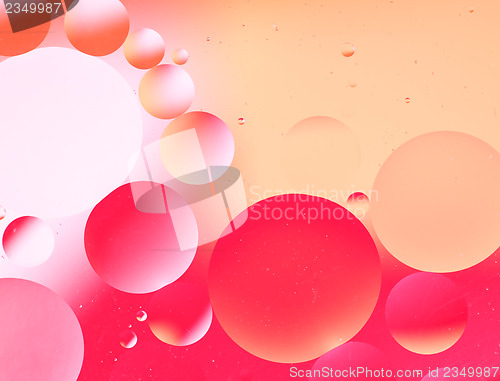 Image of Oil drop background in red color