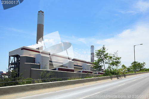 Image of Electricity plant with asphalt road