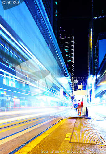 Image of City at night with busy traffic