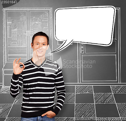 Image of Asian Man In Striped with Speech Bubble