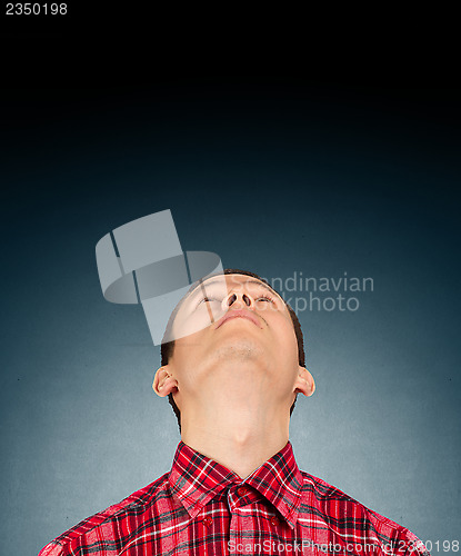 Image of Businessman Looking Upwards