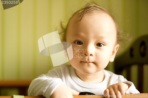 Image of Cute baby boy with funny hair