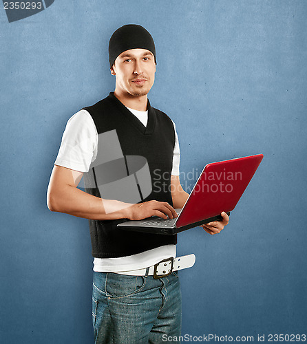 Image of Young Man With Laptop