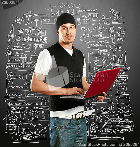 Image of Young Man With Laptop