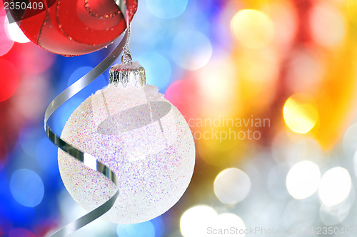 Image of Christmas baubles and ribbons