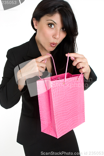 Image of Expressive woman with shopping bag