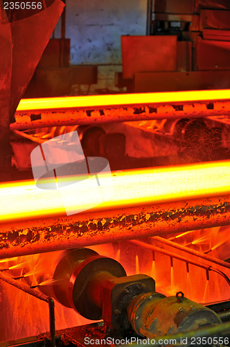 Image of hot steel on conveyor 