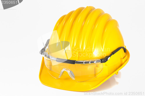 Image of Yellow helmet isolated and glasses