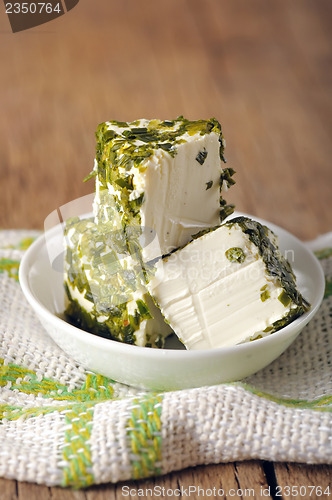 Image of cheese with herbs