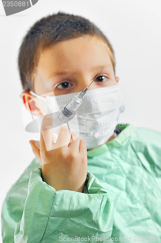 Image of Boy in uniform giving injection 