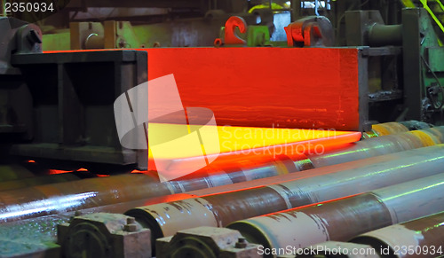 Image of hot steel on conveyor 