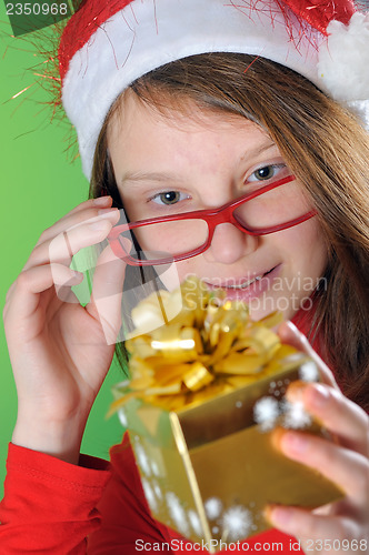 Image of little girl with present