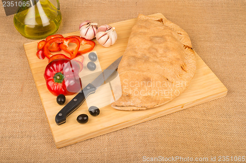 Image of Calzone and ingredients