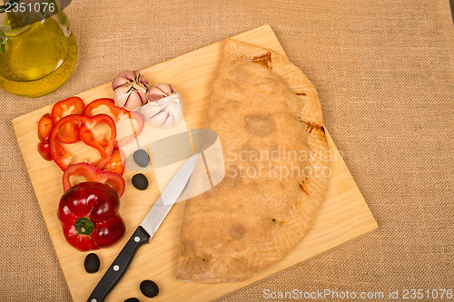 Image of Calzone and ingredients