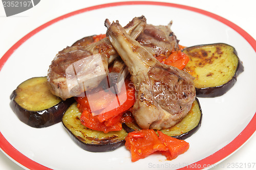 Image of Grilled lamb chops on salsa