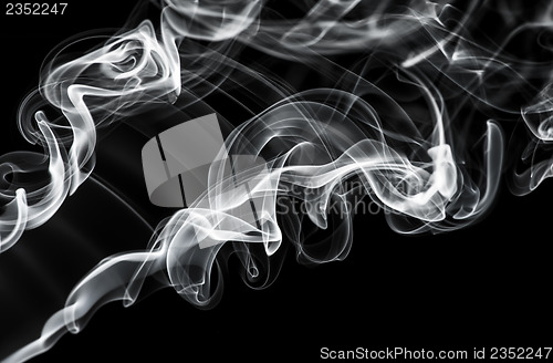 Image of Abstract fume pattern: white smoke swirls and curves 