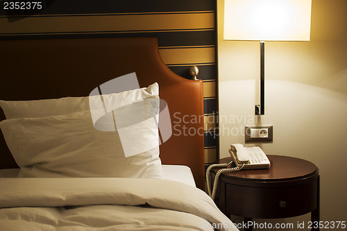 Image of Bed in luxury hotel