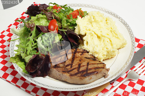 Image of Ribeye steak with salad and celeriac potatoes
