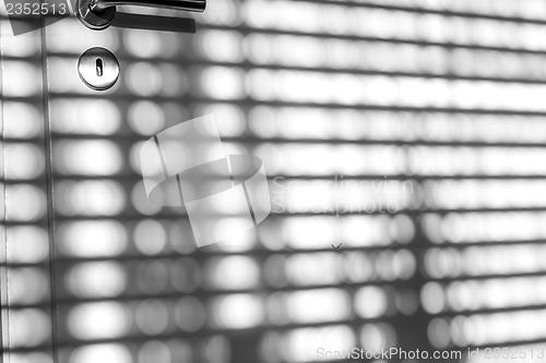 Image of door in light and shadow