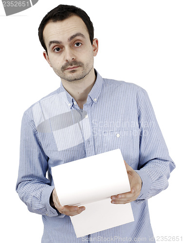 Image of Man holding a paper