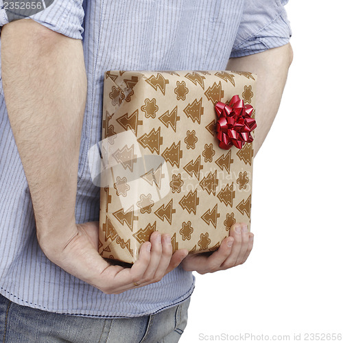 Image of Young man holding a present