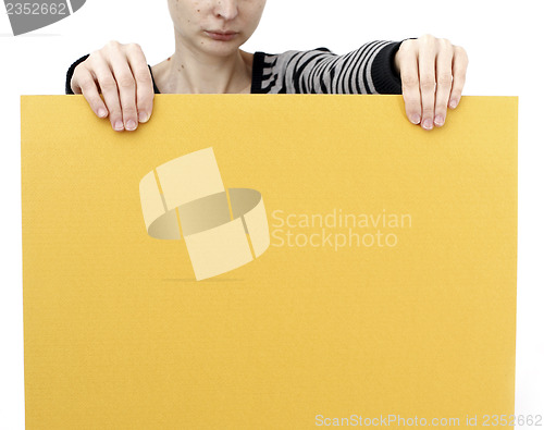 Image of Woman holding a paper