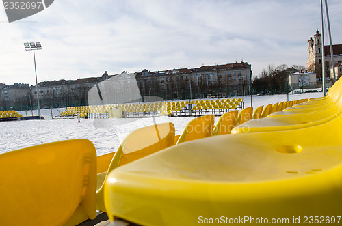 Image of volleyball court yellow chairs winter center city 