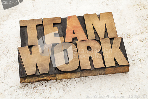 Image of teamwork word in wood type