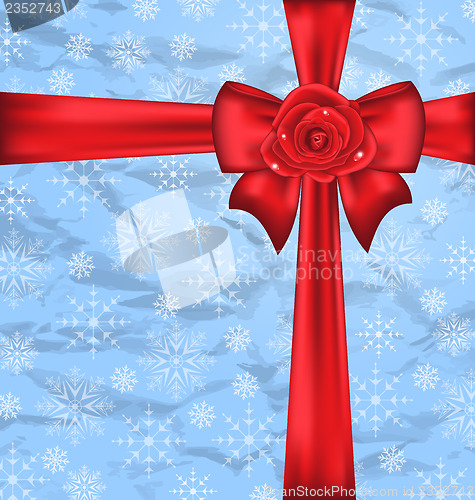 Image of Festive packing with gift bow, snowflakes texture