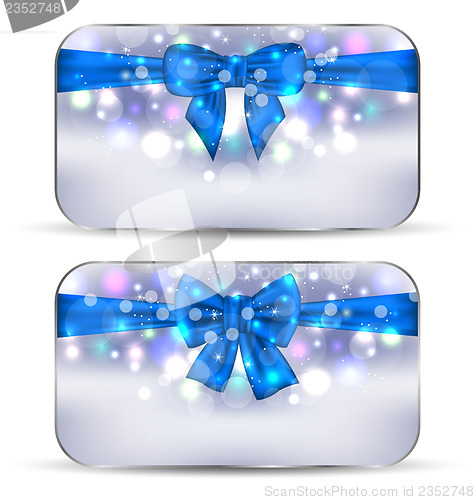 Image of Christmas glowing cards with gift bows isolated
