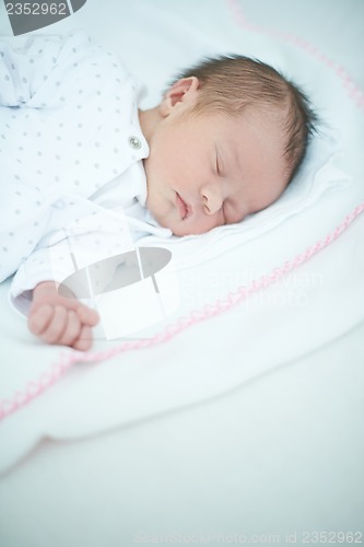 Image of Close up of Sleeping Baby on White Bed