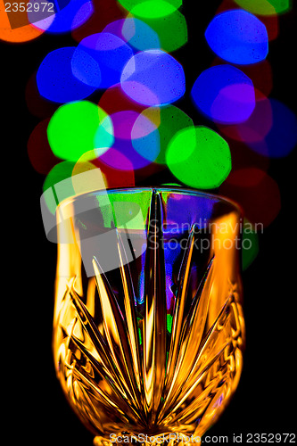 Image of Light bubbles coming out of a wine glass