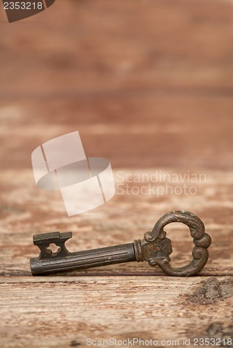 Image of Retro key on wooden table