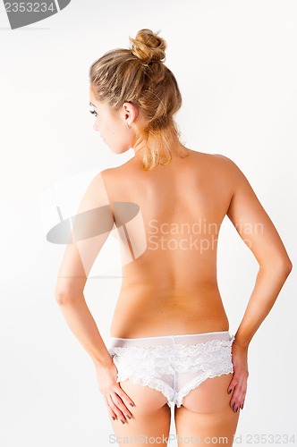 Image of Pretty woman. Back view
